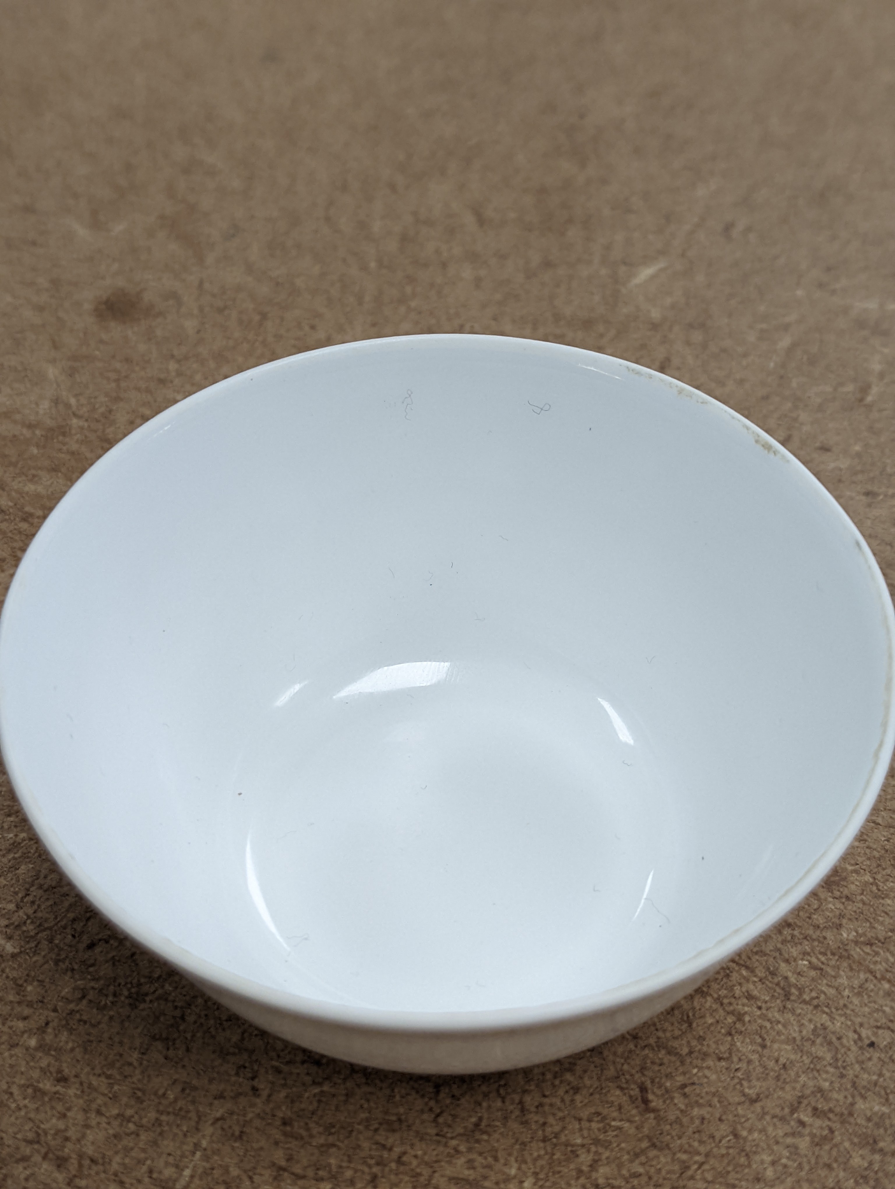 A Chinese white glazed water pot and a similar cup (2)